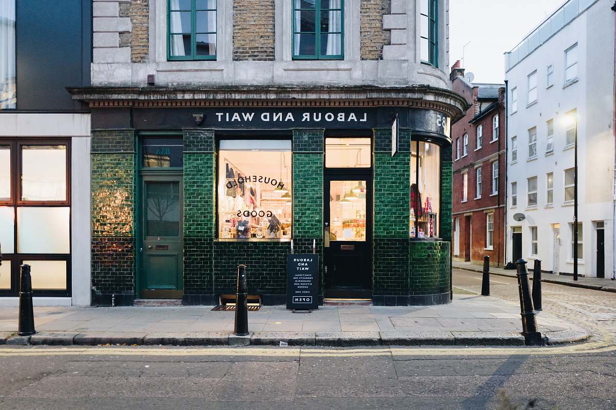 e2 7dj Labour And Wait green concrete storefront united kingdom